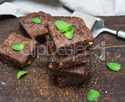 baked pieces of chocolate pie with walnuts