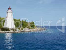 Lone lighthouse on the shore