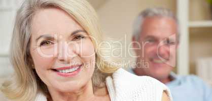 Happy Senior Man & Woman Couple Smiling at Home