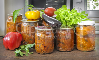 Home canning: canned vegetables in glass jars.