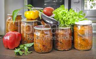Home canning: canned vegetables in glass jars.