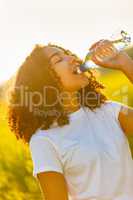Mixed Race African American Girl Teenager Drinking Water at Suns