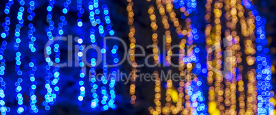 abstract blurred background with round blue and yellow bokeh