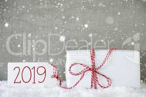 Gift, Cement Background With Snowflakes, Text 2019, Snow