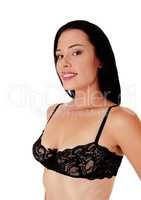 Beautiful woman in close up in a black bra