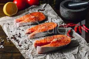 Three Salmon Steaks Prepared for Cooking