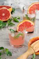 Cocktail of grapefruit and lemon basil