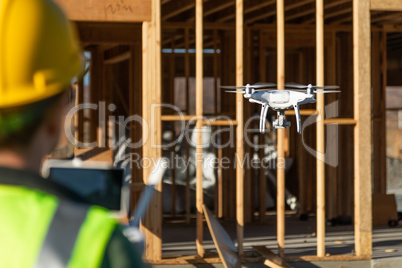 Female Pilot Flies Drone Quadcopter Inspecting Construction Site