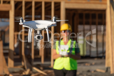 Female Pilot Flies Drone Quadcopter Inspecting Construction Site