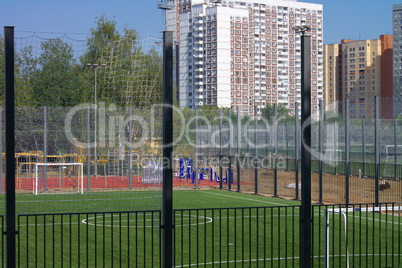 football field near fence at day sunny day