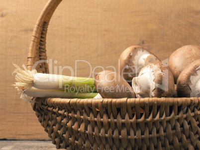 Organic mushrooms with spring onions