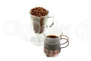 coffee in a delicate glass and coffee beans isolated on white ba