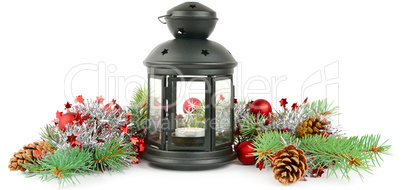 Bright ornaments, hand lantern and spruce branches isolated on w