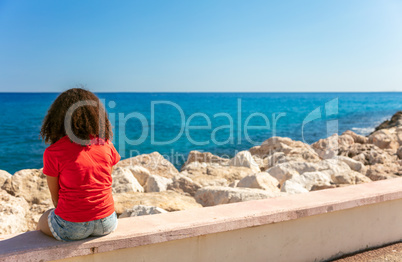 Young Woman Girl Teenager Sitting Wall Looking to Sea