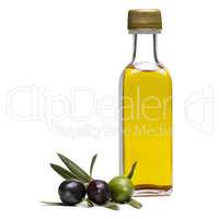Glass bottle of virgin olive oil and some organic olives