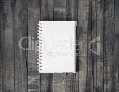 Notebook on wood