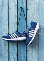 pair of male blue textile sneakers