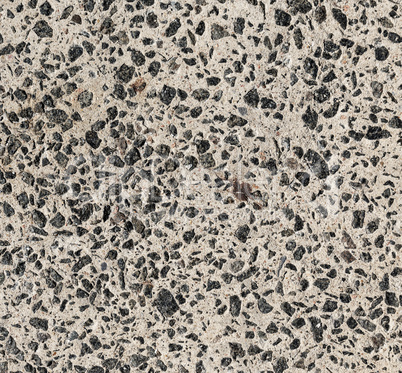 cement texture with small black granite stones
