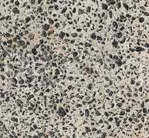 cement texture with small black granite stones