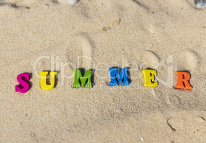 inscription summer from multi-colored wooden letters