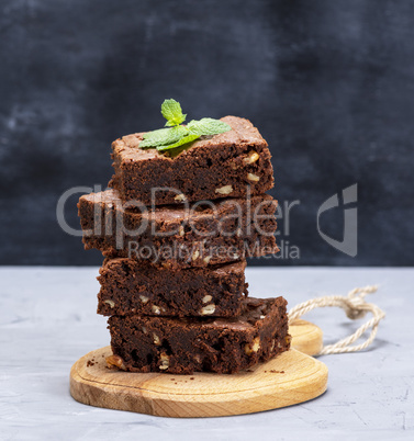stack of baked square pieces of brownie pie