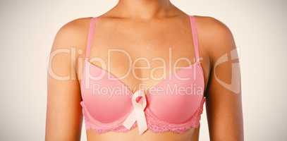 Woman for breast cancer awareness with ribbon