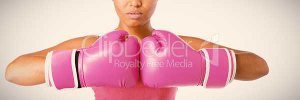 Woman for breast cancer awareness in boxing gloves