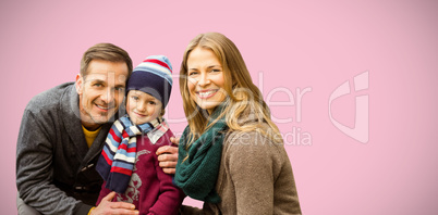 Composite image of  portrait of family smiling together