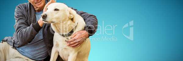 Composite image of smiling old man sitting stroking his pet dog