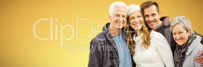 Composite image of  happy family standing together and smiling