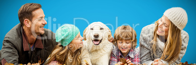 Composite image of young family with a dog