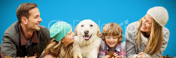 Composite image of young family with a dog