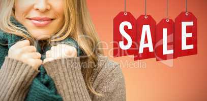 Composite image of smiling pretty woman holding her scarf