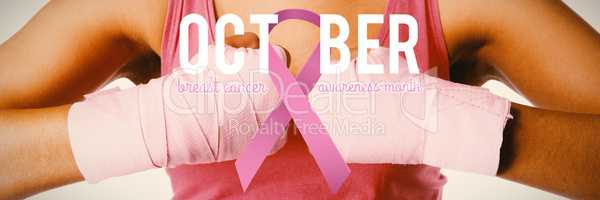 Composite image of breast cancer awareness ribbon with text