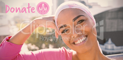 Composite image of graphic image of donate text with breast cancer awareness ribbon