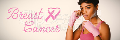 Composite image of breast cancer text with ribbon