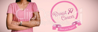 Composite image of women in pink for breast cancer focus on crossed arms