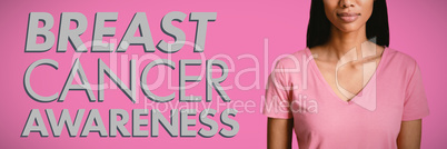 Composite image of women in pink standing for breast cancer