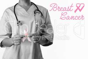 Composite image of breast cancer text with ribbon