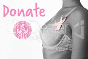 Composite image of graphic image of donate text with breast cancer awareness ribbon