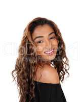 Beautiful teenager girl looking over her shoulder, smiling