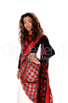 Portrait of East Indian teenager girl standing in a saree