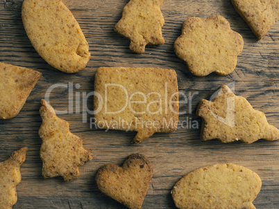Tasty Christmas cookies on wood