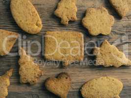Tasty Christmas cookies on wood