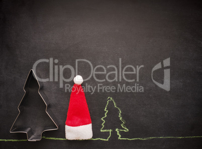 Christmas decoration on a blank chalkboard
