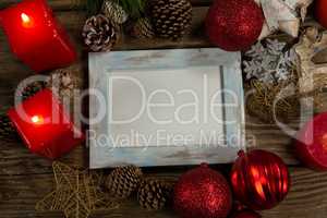blue wooden frame with Christmas ornament