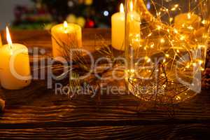 Cozy Christmas ornaments on wooden table