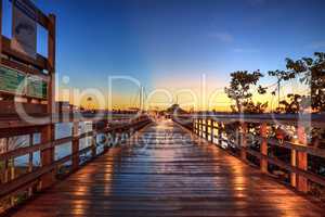 Sunrise over Naples City Dock in Naples, Florida.