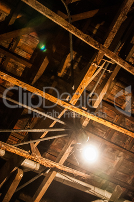 Indoor shabby wood roof of a house.