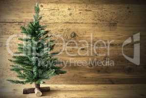 Green Christmas Tree On Brown Vintage Background